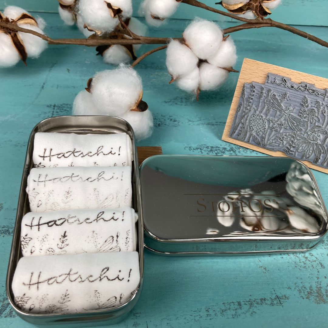 Tiny stainless steel box with 4 StoffOS